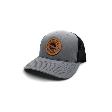 The Qualified Captain Leather Patch Trucker Hat